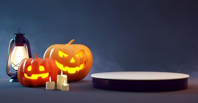 two jack - o'- lanterns, one lit and the other on a table Halloween Podium Cozy Halloween Ambiance, Diy Halloween Decoration Ideas, Halloween Pumpkins With Candles And Lantern, dark slate gray