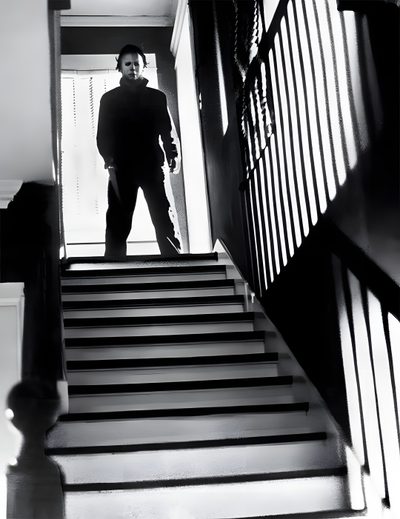 a man standing on top of a set of stairs Halloween 1978 Michael Myers Standing In Shadows, Michael Myers Stairs, Michael Myers In Shadow, dark slate gray