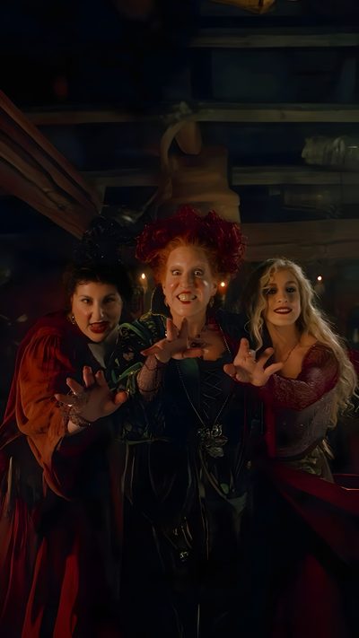 three women dressed in costumes posing for the camera with their hands up and lights on Hocus Pocus Halloween Iconic Halloween Movie Scenes, Halloween Movie Characters, Halloween Movie Backgrounds, black