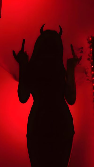 the silhouette of a woman with horns on her head and hands up in front of a red light Halloween Baddie Devil Aesthetic, Iphone Violet, Dark Red, Witchy, Gothic, Demon Girl, maroon