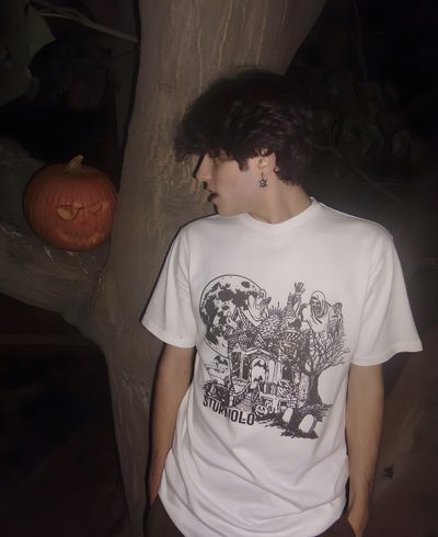 a young man standing next to a tree with a pumpkin in the background and an orange pumpkin behind him Sturniolo Halloween Matt Sturniolo Ghostface, Matt Sturniolo Young Photos, Matt Sturniolo Modeling, dark slate gray