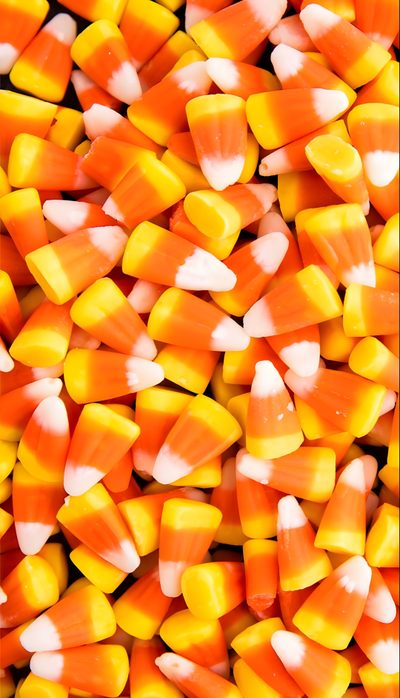 an image of candy corn close up Halloween Candy Corn Haloween Candy, Halloween Candies, Orange Candy Corn, Candy Corn Orange,