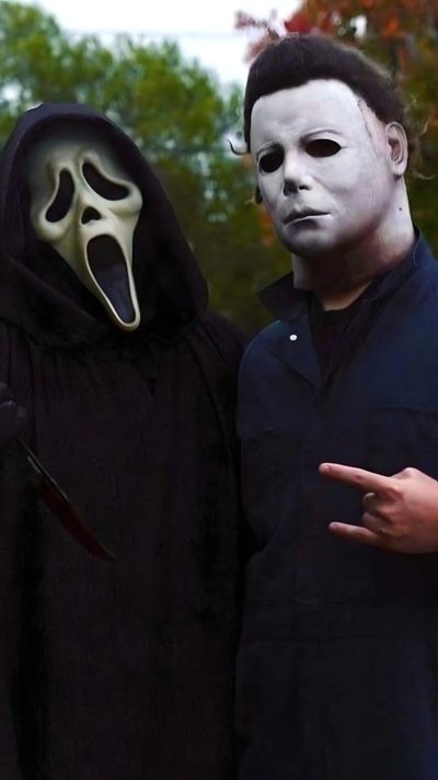 two people dressed in halloween costumes standing next to each other, one wearing a mask and the other holding a knife Max And Tommy Halloween Michael Myers And Scream, Michael Myers Ghostface, Michael Myers, Scream, black