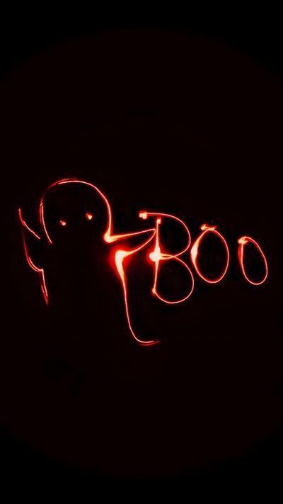 a black background with red lights in the shape of an elephant and two smaller elephants Halloween Boo - Anthracite Ios Halloween, Purple Halloween Boo, Boo Ghost, Red And Black Halloween,