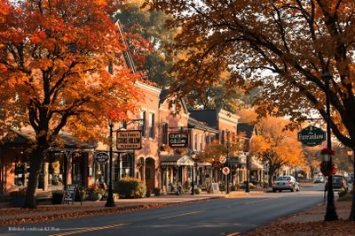a street lined with lots of trees covered in fall leaves Halloween Town Background Landscape Fall, Fall Town, Herbst Rezepte, Fall Background, saddle brown