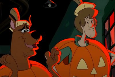 an animated image of two people dressed up as dogs and pumpkins, with one holding a jack - o'- lantern Scooby Doo Halloween 1920x1080 Cartoon Themed Party Inspiration, Halloween Cartoon Characters, Halloween Costume Ideas For Kids, maroon