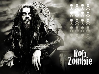 a man with long hair sitting down in front of a black and white background that says rob zombie Halloween Rob Zombie Rob Zombie Iphone, Rob Zombie Live Laugh Love, White Zombie, dark slate gray