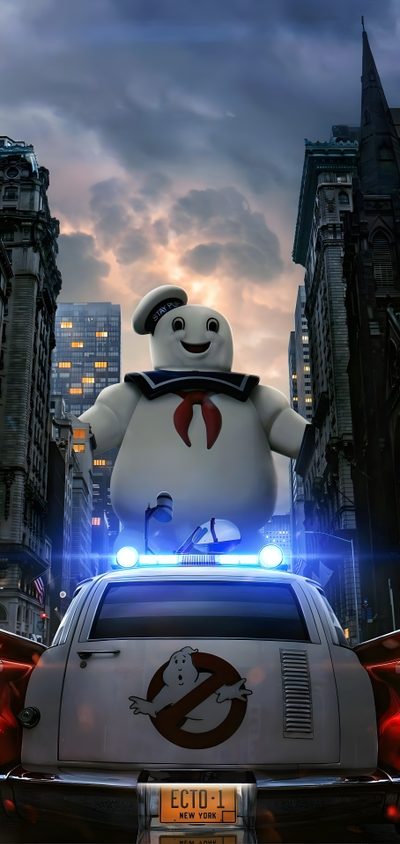 a large white teddy bear sitting on top of a car in the middle of a city Ghostbusters Halloween Slimer Ghostbusters, Ghostbusters Car, Marshmallow Man, dark slate gray