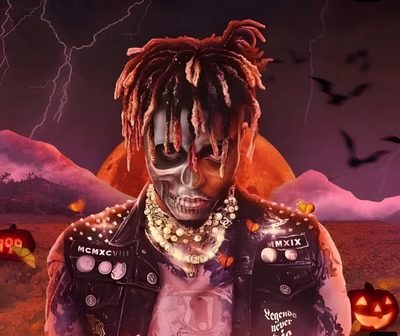 a man with dreadlocks standing in front of a halloween scene and pumpkins Halloween Juice Wrld Juice Wrld Halloween, Juice Wrld Zombie, Juice Wrld Skull, saddle brown