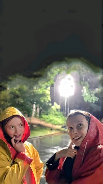 two women standing next to each other in front of a fountain at night with lights on Matching Stranger Things And Halloween Characters Stranger Things, Sadie Sink, Brown, dark slate gray