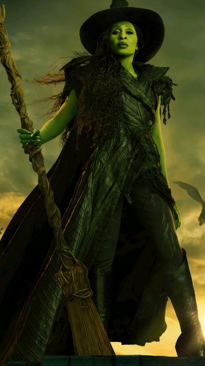 a woman dressed in green holding a broom and wearing a witches hat with her hands Wicked Halloween Cynthia Erivo, 4k Hd, Cool Posters, Pink And Green, Cute, Wicked, black