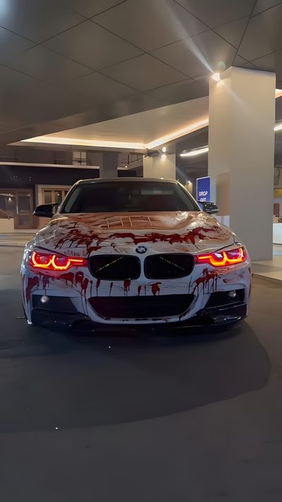 a car with blood all over it parked in a parking garage Halloween Car Bmw Wrapped, Red And White Bmw, M5 Wrap, Bmw Painting Ideas, Bmw Wrap, dark slate gray