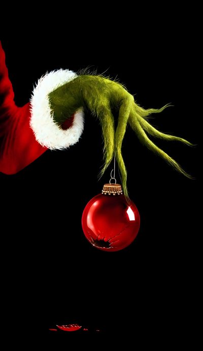 an ornament hanging from the side of a christmas tree with a grin face on it Halloween Grinch Christmas Phone Grinch, Grinch Background, Grinch Hand Background, Black Grinch,