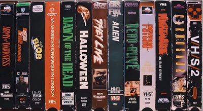 a row of vhs movies sitting on top of each other Vhs Halloween Gravity Falls 80s, Halloween Aesthetic 80s, 80s Spooky Aesthetic, dark slate gray