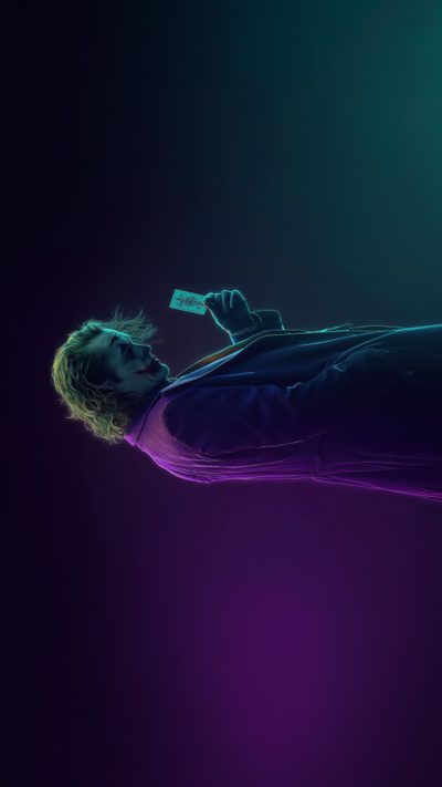 a man laying on top of a bed under a purple light with a credit card in his mouth Juvea Halloween 4k Joker For Pc, Joker Quotes, Animal Logo, Pc, Quotes, Animals, black