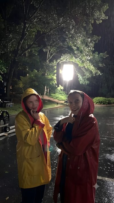 two women in raincoats standing on the side of a road at night, one holding an umbrella Matching Stranger Things And Halloween Characters Max Shoes, Strangerthings, Elmax, Max, dark slate gray