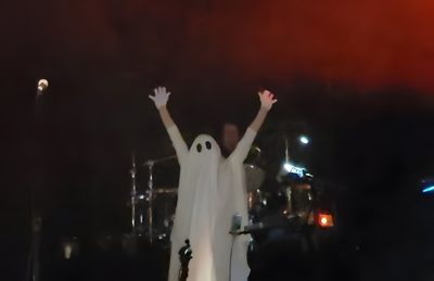 a man in a ghost costume standing on stage with his hands up and arms wide open Mcr Halloween Mcr Memes, Frank Iero, Gerard Way, Kid Memes, Music Memes, My Chemical Romance, black