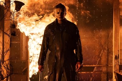 a man standing in front of a fire Halloween Kills 4k Film, Halloween, Donald Pleasence, Book Background, The Boogeyman, saddle brown