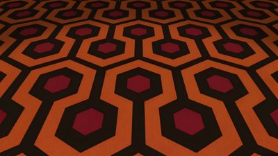an orange and black carpet with hexagonal shapes The Shining Laptop Halloween The Shining Carpet, Shining Carpet, The Shining Carpet Pattern, maroon