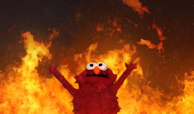 the sesame street character is standing in front of a fire with his hands up and eyes wide open Halloween Meme Elmo In Fire Meme, Fire Muppet Meme, Nuclear Elmo, Elmo On Fire Sticker, saddle brown