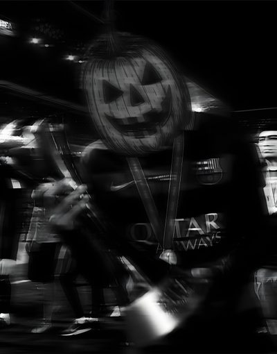 black and white photograph of people walking down the street with halloween decorations on their heads Football Halloween Psg Neymar, Halloween, black