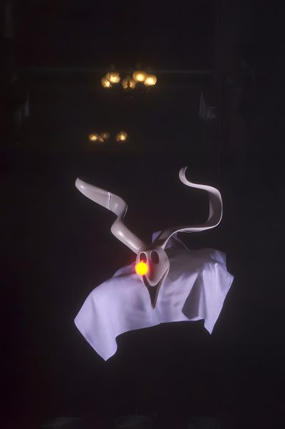 a white object with yellow light on it's face in the dark, near some lights Zero Halloween Nightmare Before Christmas Characters, Zero Nightmare Before Christmas Movie Stills, Christmas Night, black