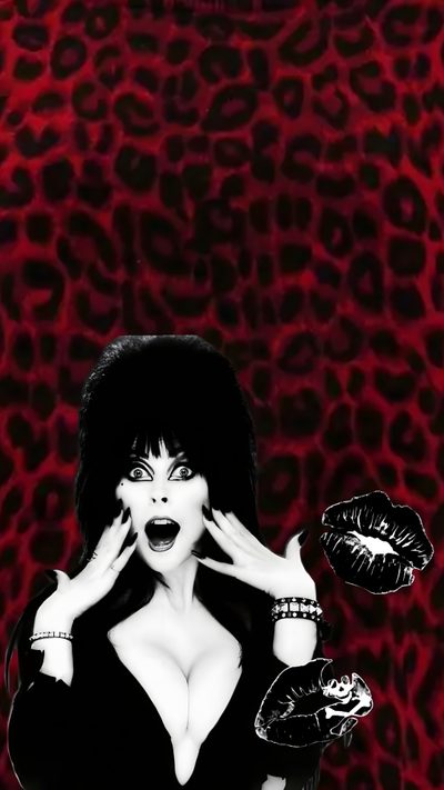 a woman with her hands on her face in front of a leopard print wallpaper Elvira Halloween Elvira Mistress Of The Dark, Vintage Horror Iphone, Scary Goth, Horror Iphone, black