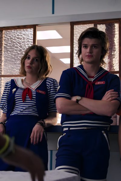 two people in sailor outfits standing next to each other with their arms crossed and looking at the camera Matching Stranger Things And Halloween Characters Steve And Robin Costume, Steve And Robin, Steve Harrington Stranger Things, dark slate gray