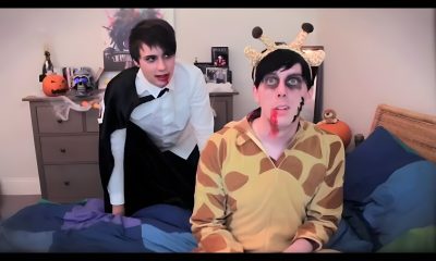 two people dressed up in costumes standing on a bed and one is making a funny face Dan And Phil Halloween 2009 Dan And Phil Fnaf, Dan And Phil Cat Makeup, Dan And Phil Jamaica, gray