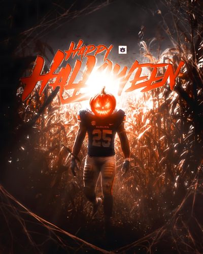 a football player with an orange pumpkin on his face in the middle of a cornfield Cool Halloween Football Auburn Football, Auburn, Happy Halloween, Football, Halloween, black