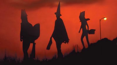 the silhouettes of three scarecrows against an orange sky Halloween 3 Season Of The Witch Halloween Movie Stills, Halloween Witch Movie, Season Of The Witch Movie, saddle brown