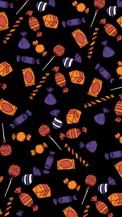 an assortment of candy on a black background with orange, purple and pink candies Halloween Candy For Walls Halloween Candy Iphone, Halloween Textures, Retro Halloween, black