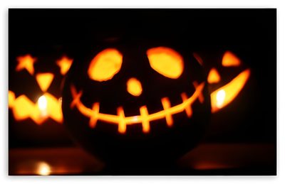 an image of a carved pumpkin with glowing eyes and mouth marks on it's face Dual Monitor Halloween Facebook Cover Photos Halloween, Halloween Facebook Cover, Halloween Fb Covers, black