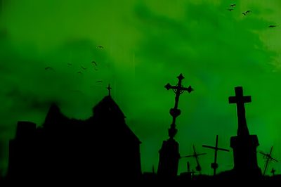 silhouettes of buildings and crosses against a green sky Green Halloween Desktop Green Sky Halloween Scene, Halloween Decoration Ideas, Silhouette Of Cemetery Under Green Sky,