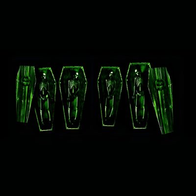 three green suits are shown in the dark Type O Negative And Pantera On Halloween Type O Negative Logo, Black And Green Widgets, Green Goth Aesthetic,