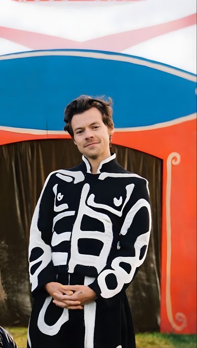 a man is standing in front of a tent Harry Styles Happy Halloween Iphone Harry Styles Pumpkin Painting, Harry Styles Circus, Harry Styles Pumpkin, dim gray