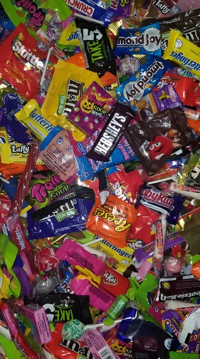 a pile of candy bars sitting next to each other Halloween Candy Retro Halloween Candy, 80s Halloween Candy, Halloween Candy Pinterest, dark olive green