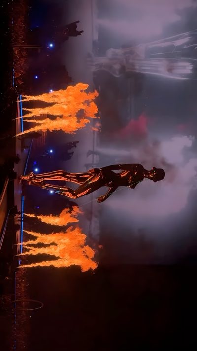 a man is flying through the air on fire The Weeknd Halloween The Weeknd, Instagram, dark slate gray