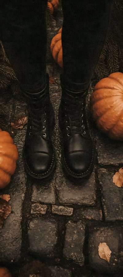 a person wearing black boots standing on top of a brick walkway next to pumpkins Halloween Retro Shoes With Pumpkins Autumn Spooky Aesthetic, Fall Spooky Aesthetic, Spooky Fall Aesthetic, black
