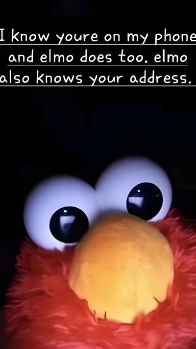 a close up of a stuffed animal with a caption that reads, i know you're on my phone and elmo does too Elmo Halloween Funny Elmo Picture, Elmo Black, Funny Backgrounds Elmo, Elmo Profile Picture,