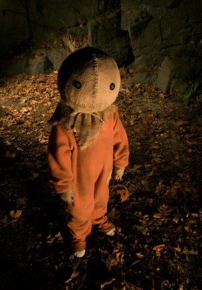 black and white photograph of a teddy bear in the woods with leaves on the ground Halloween Sam Sam Trick R Treat Movie Images, Trick R Treat Characters, Trick R Treat Film, black