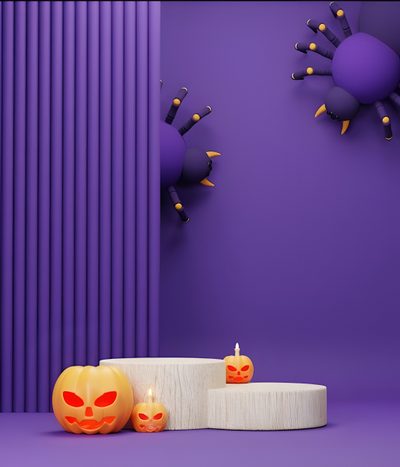 two carved pumpkins sitting next to each other in front of purple walls and decorations Halloween Podium Halloween Decorations With Pumpkins And Spider, Halloween Party Decoration Ideas, Modern Halloween Home Decor, dark slate blue