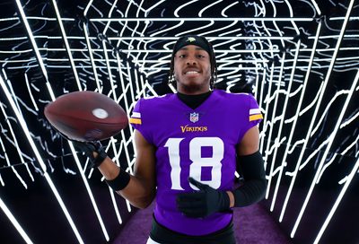 a man holding a football in his right hand and wearing a purple jersey with the number 18 on it Justin Jefferson Halloween Justin Jefferson Pc, Justin Jefferson Vikings Griddy, Minnesota Vikings Justin Jefferson Gif, black