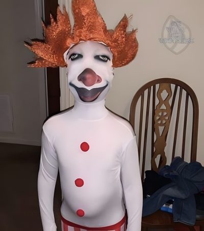 a man in a clown costume standing next to a chair Goofy Ahh Halloween Whatsapp Hd, Images Hello Kitty, Hello Kitty Images, Image Swag, Goofy Pictures, gray