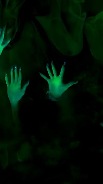 two hands are glowing in the dark with green glowers on their fingers and arms Scary Halloween Gif Animation Background, Moving Backgrounds, Moving, Cinematic Lighting, Live Screen, black