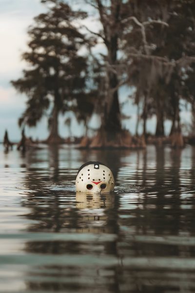 a white ball floating on top of a body of water next to trees in the background Camp Crystal Lake Halloween Summer Ween, Spooky Photos, Horror Iphone, Horror Pics, dark olive green