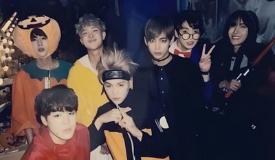 a group of young men posing for a photo in front of a halloween tree with fake pumpkins on it Bts Halloween Laptop Bangtan Photos, Fall Bts, Bts Year, Bts Orange, Bts Eras, dark slate gray