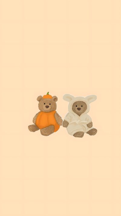 two teddy bears sitting next to each other in front of a beige background with an orange and white bear Jellycat Halloween Cute Fall Lockscreen, Matching Fall, Cute Fall Ipad, Iphone Background, Cool, peach puff