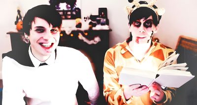 two people dressed up in costumes and holding books Dan And Phil Halloween 2009 Dan And Phil Halloween 2009, Dan And Phil 2009, Dan And Phil Book, antique white
