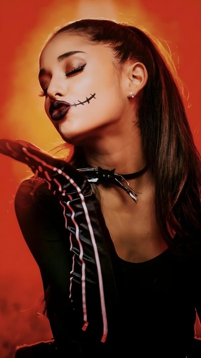 a woman with her face painted like a skeleton wearing a choker and leather gloves Ariana Grande Halloween Ariana Grande Jack Skellington, Ariana Grande Mac Miller Halloween, Ariana Grande Demon, maroon